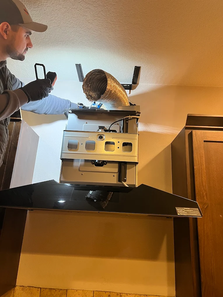 Master Appliance technician diagnosing a kitchen appliance